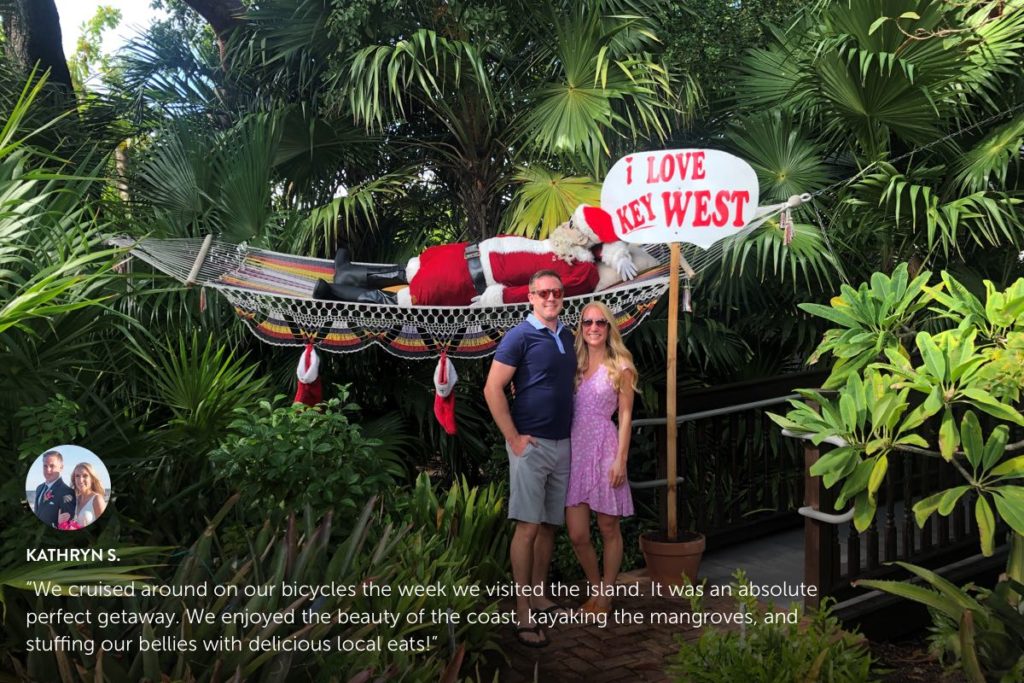 Photo submission from Kathryn S. standing in front of palm trees in Key West.