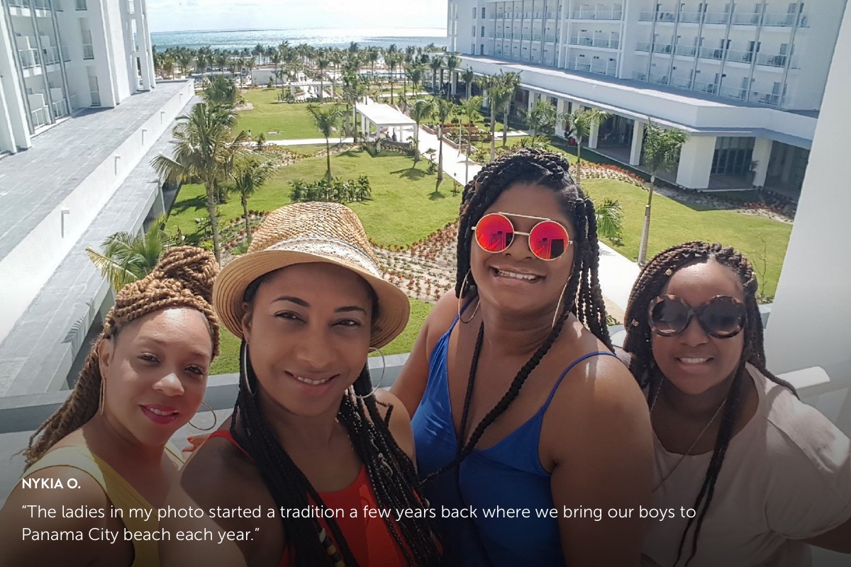 Photo submission from Nykia O. showing 4 african american females enjoying the sun on a hotel balcony