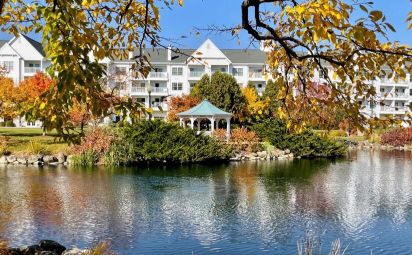 Landscape orientation photo of The Osthoff Resort grounds and building in autumn